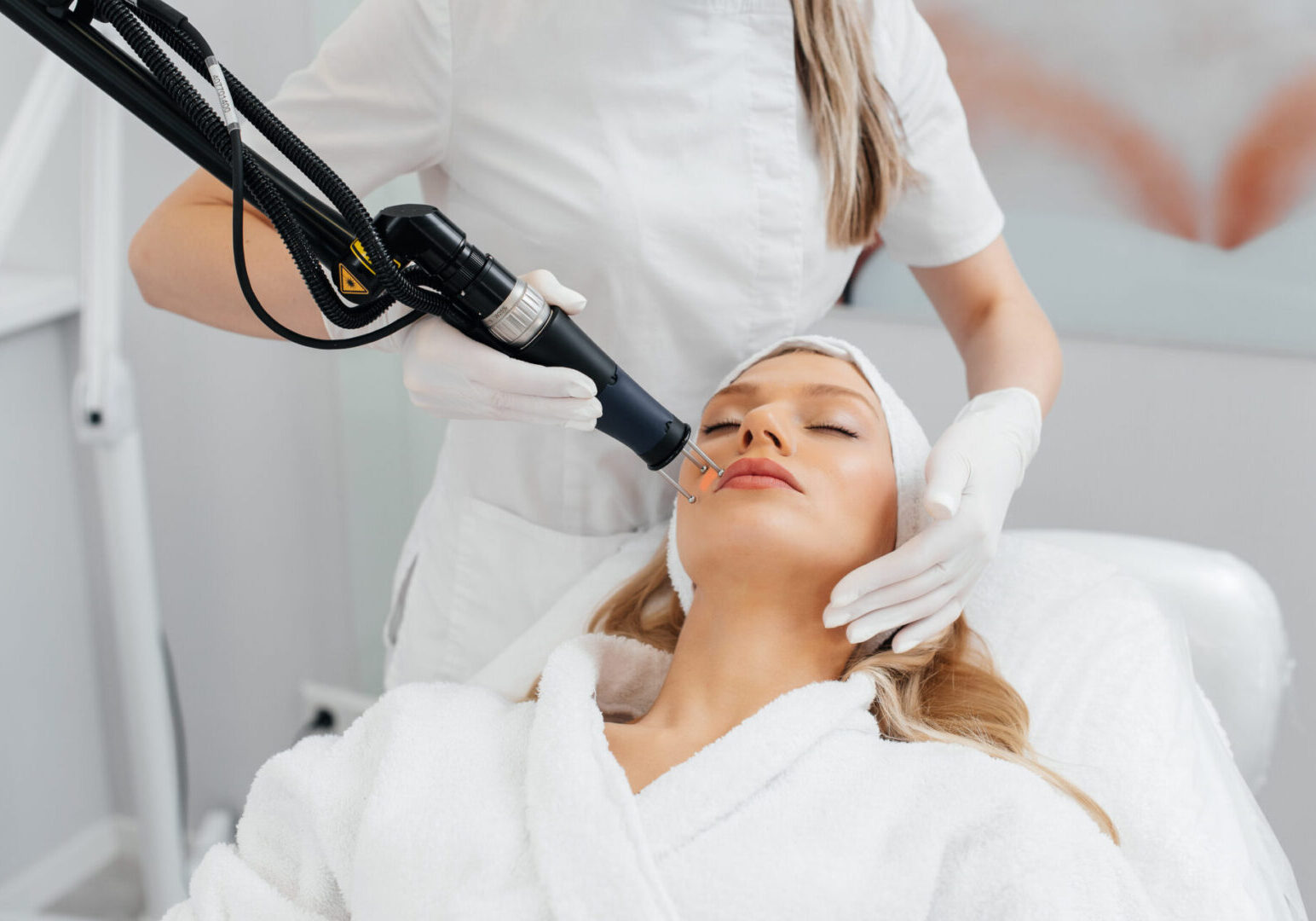 A woman getting her hair cut at the salon